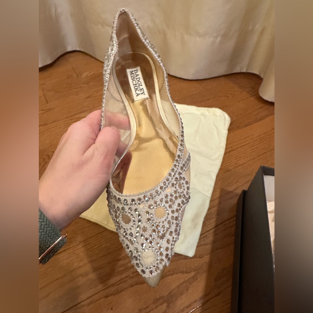 Badgley Mischka ivory flats with silver and white gems. Perfect wedding shoes!